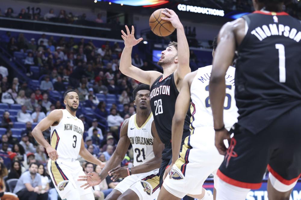 改航班放弃度假，格林斯比球迷父子看了战胜曼联的史诗级比赛